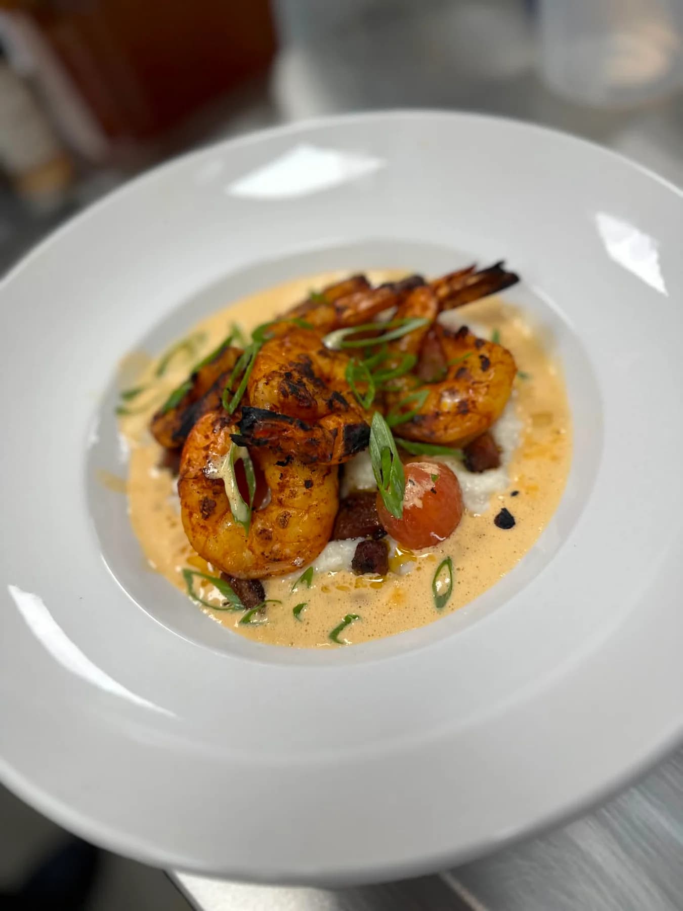 A composed shrimp plate cooked during Sigi's hotel training in Spain.