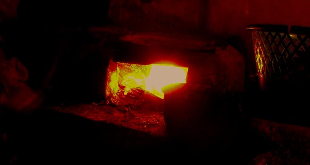 Wood burning inside a clay oven
